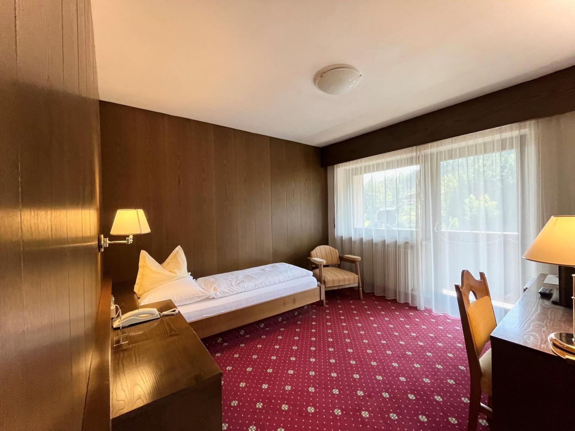 Hotel Am Wolfgrubenersee ソプラボルツァーノ エクステリア 写真