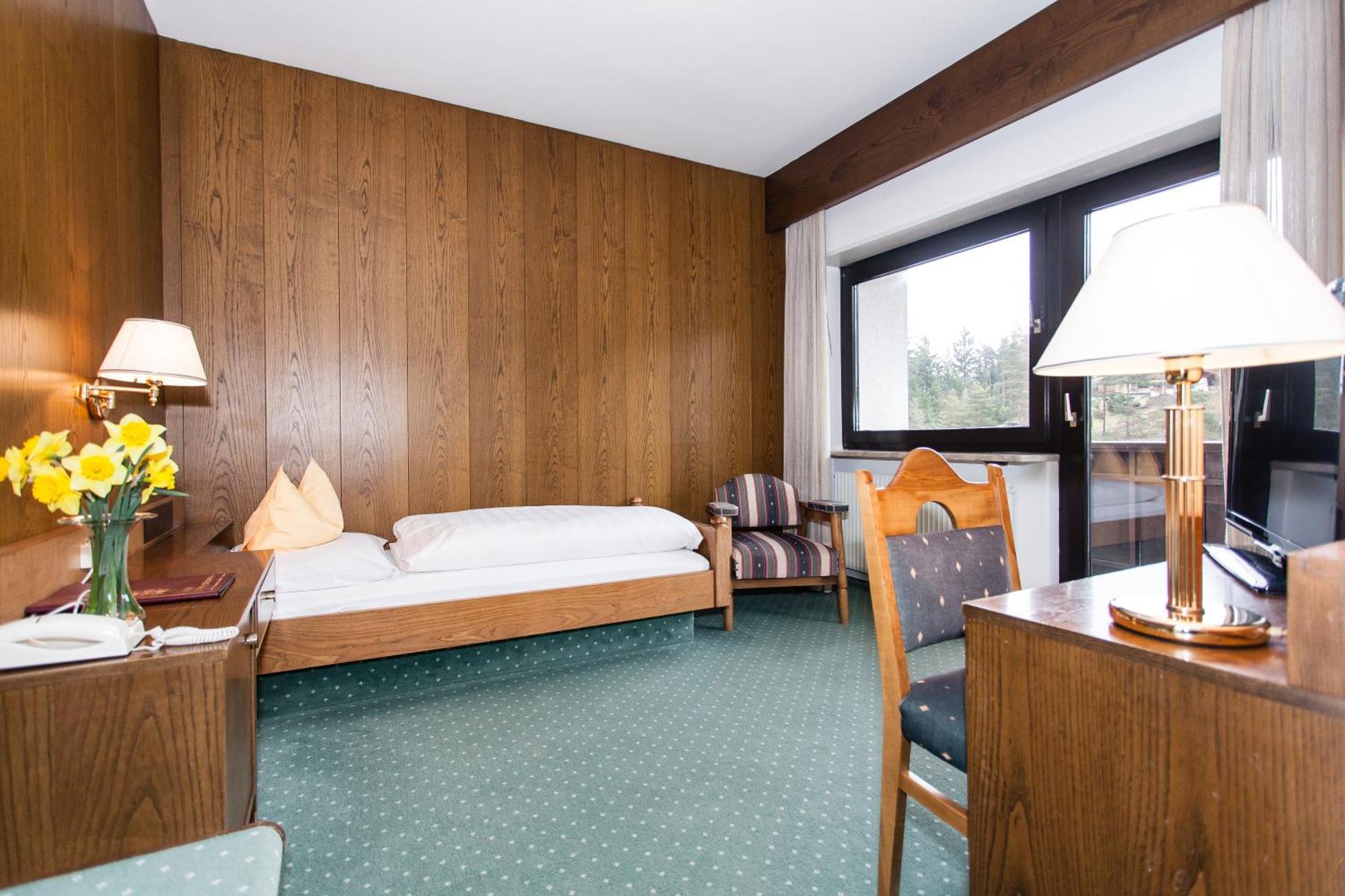 Hotel Am Wolfgrubenersee ソプラボルツァーノ エクステリア 写真