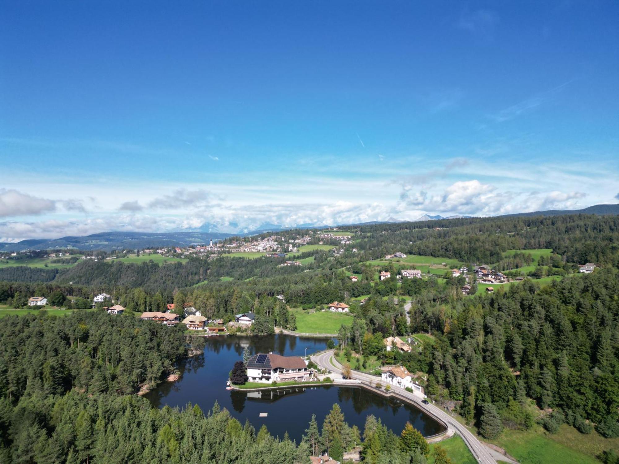 Hotel Am Wolfgrubenersee ソプラボルツァーノ エクステリア 写真