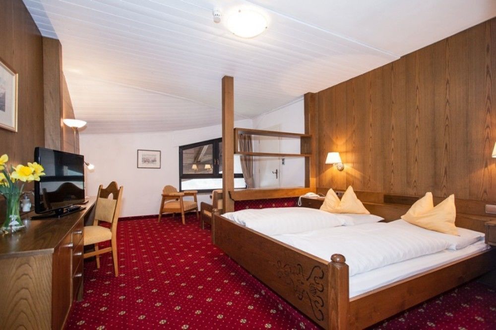 Hotel Am Wolfgrubenersee ソプラボルツァーノ エクステリア 写真