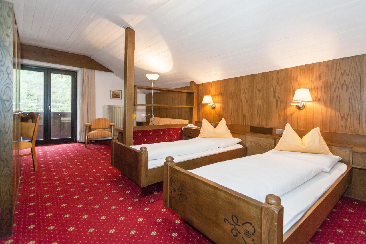 Hotel Am Wolfgrubenersee ソプラボルツァーノ エクステリア 写真